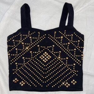 Bongo top with gold jewel accents